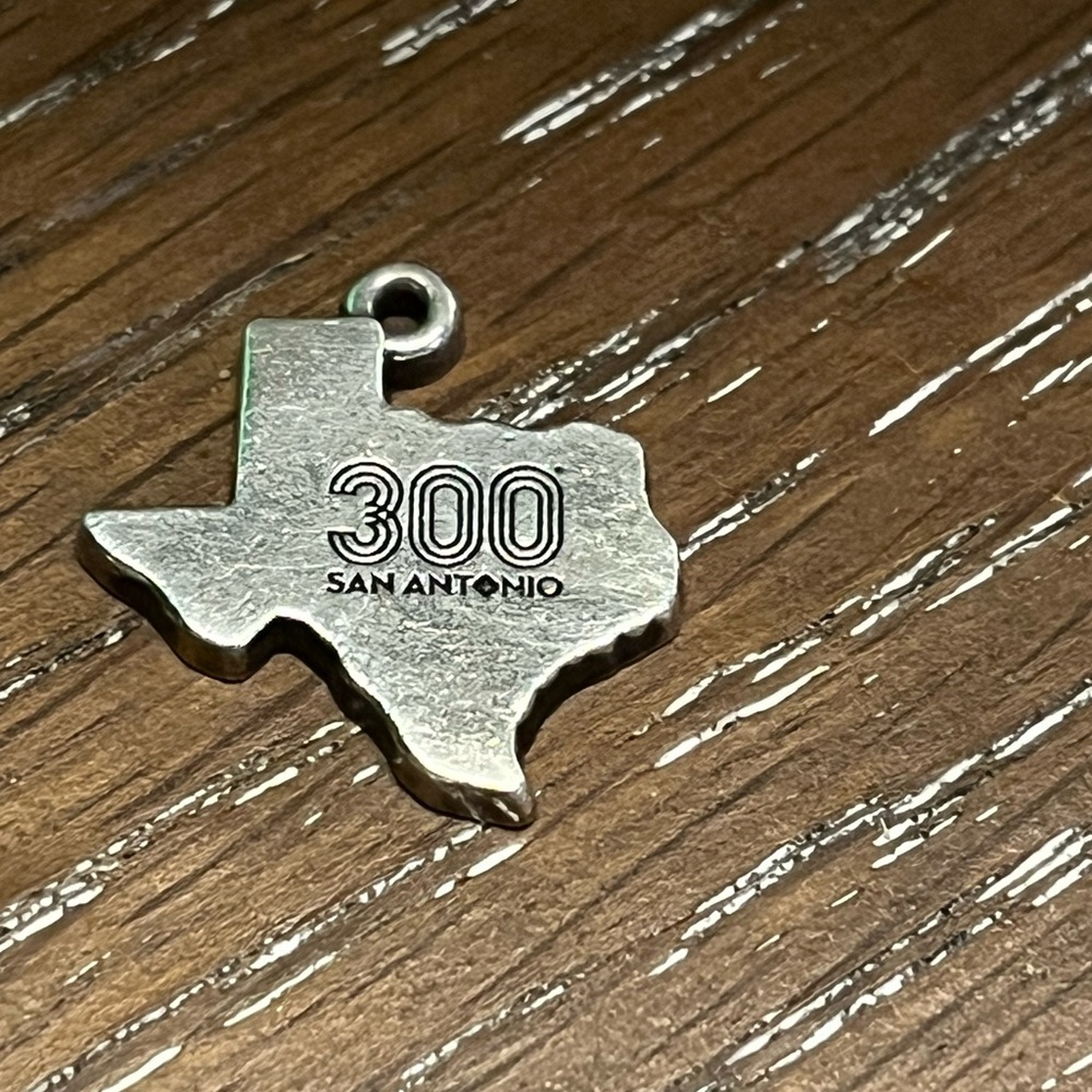 Hay y’all!! Super collectible san antonio tricentennial limited edition charm.